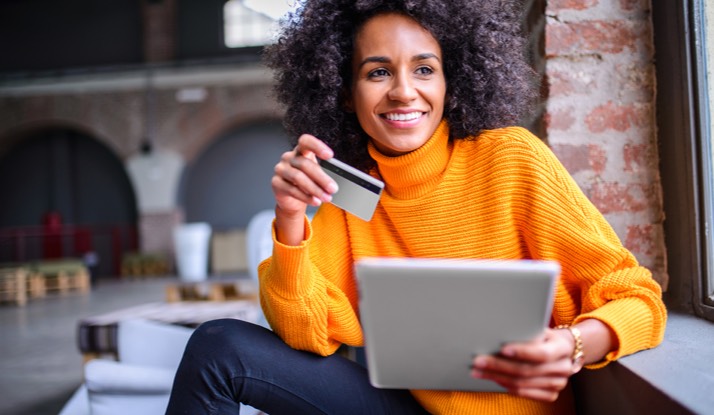 woman paying with a credit card online